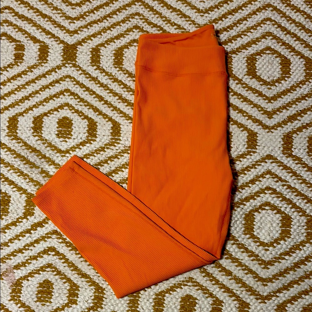 Barry’s Boot Camp tangerine ribbed leggings